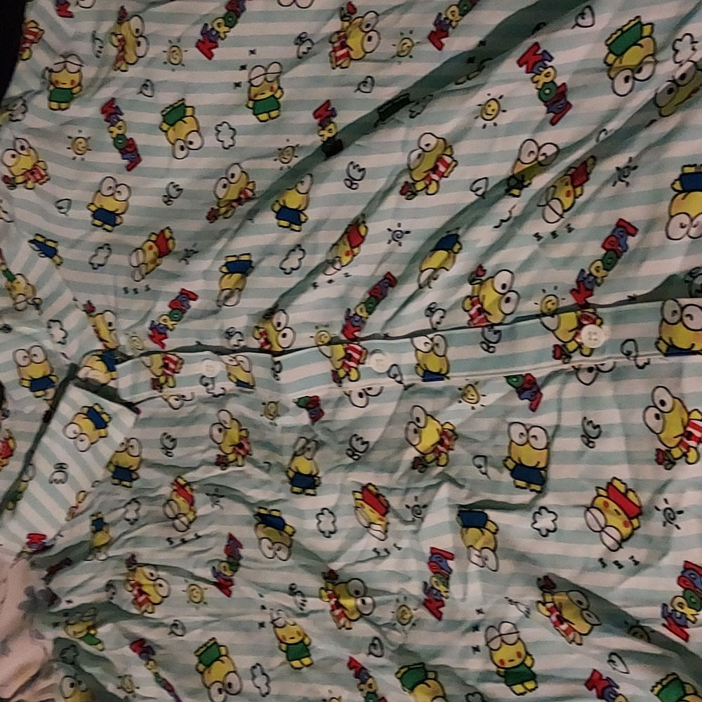 Very large button of t-shirt